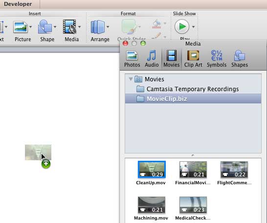 Movie clip being dragged and inserted onto the slide area