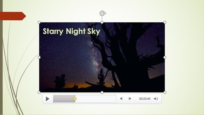 A slide with a video clip and a Text Box