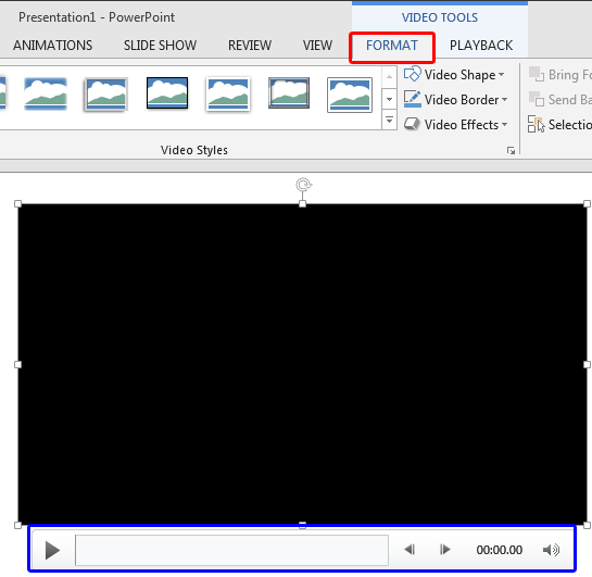 Inserted video clip appears as a black rectangle